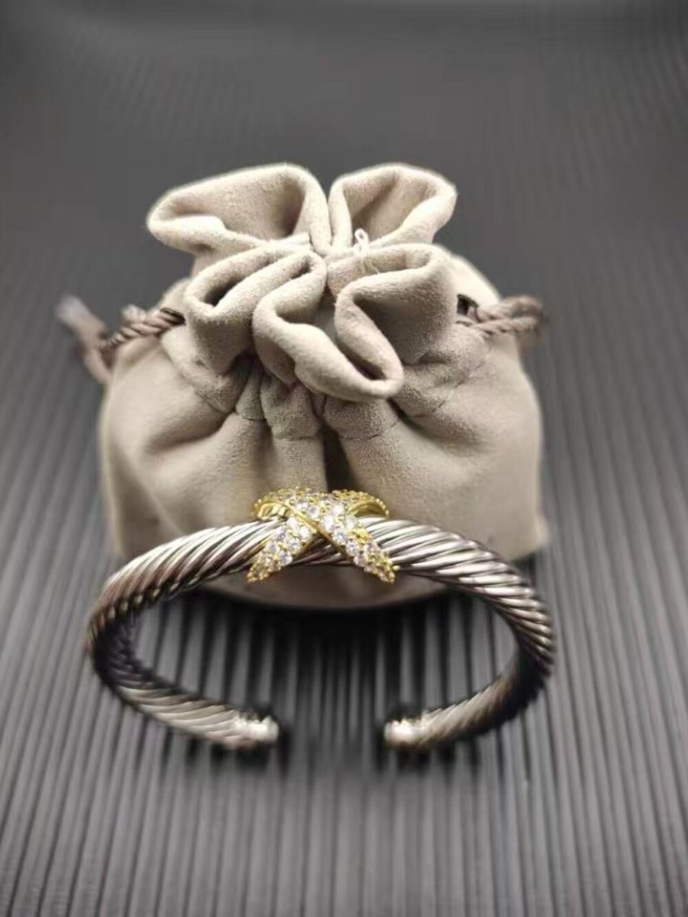 David Yurman's bracelet with a cross motif